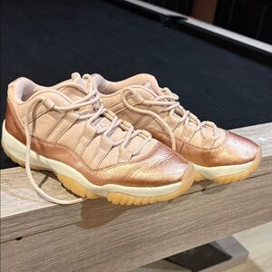 Jordan 11’s Women's Sneakers in Rose Gold.